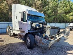 Salvage trucks for sale at Charles City, VA auction: 1999 Volvo VN Semi Truck