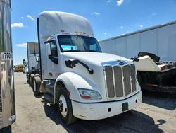 Salvage trucks for sale at Cahokia Heights, IL auction: 2017 Peterbilt 579 Semi Truck