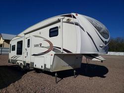Salvage trucks for sale at Avon, MN auction: 2011 Sabre By Forest Rive 2011 Forest River Sabre Camper