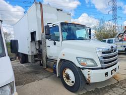 Salvage trucks for sale at Wheeling, IL auction: 2012 Hino 338 BOX Truck