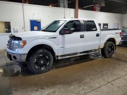 Salvage trucks for sale at Blaine, MN auction: 2011 Ford F150 Supercrew
