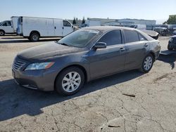 Salvage cars for sale from Copart Bakersfield, CA: 2009 Toyota Camry Hybrid