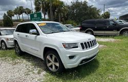 Vehiculos salvage en venta de Copart Orlando, FL: 2014 Jeep Grand Cherokee Overland