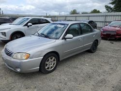 KIA salvage cars for sale: 2004 KIA Spectra Base