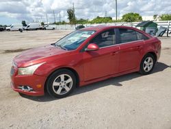 Salvage cars for sale from Copart Miami, FL: 2012 Chevrolet Cruze LT