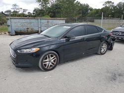 Salvage cars for sale from Copart Fort Pierce, FL: 2016 Ford Fusion SE