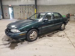 Salvage cars for sale from Copart Savannah, GA: 1995 Pontiac Grand AM SE