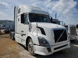Salvage trucks for sale at Magna, UT auction: 2011 Volvo VN VNL