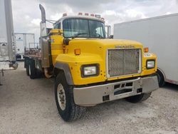 Salvage trucks for sale at Haslet, TX auction: 1997 Mack RD690S Flatbed Truck