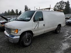 Salvage cars for sale from Copart Graham, WA: 2001 Ford Econoline E350 Super Duty Van