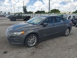 Salvage cars for sale from Copart Miami, FL: 2017 Ford Fusion SE Hybrid