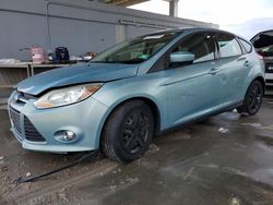 Salvage cars for sale from Copart West Palm Beach, FL: 2012 Ford Focus SE