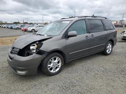 Toyota Sienna xle salvage cars for sale: 2005 Toyota Sienna XLE