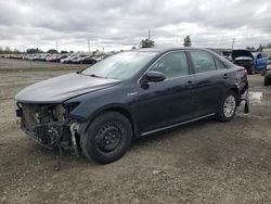 Toyota salvage cars for sale: 2014 Toyota Camry Hybrid