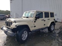 Jeep Wrangler salvage cars for sale: 2011 Jeep Wrangler Unlimited Sahara