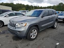 Salvage cars for sale from Copart Exeter, RI: 2011 Jeep Grand Cherokee Laredo