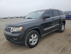 Jeep Grand Cherokee salvage cars for sale: 2011 Jeep Grand Cherokee Laredo