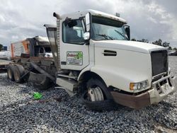 Volvo vhd roll-off Container tr salvage cars for sale: 2002 Volvo VHD ROLL-OFF Container Truck