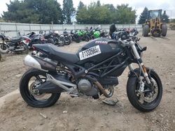 Salvage motorcycles for sale at Elgin, IL auction: 2011 Ducati Monster 696