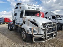 Salvage trucks for sale at Magna, UT auction: 2021 Volvo VNL Semi Truck
