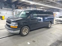 Salvage trucks for sale at Wheeling, IL auction: 2014 Chevrolet Express G1500