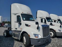 Salvage trucks for sale at Memphis, TN auction: 2015 Peterbilt Tractor 2015 Peterbilt 579 Semi Truck