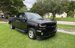 Salvage trucks for sale at Homestead, FL auction: 2017 Chevrolet Silverado K1500 LT