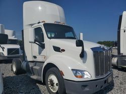 Salvage trucks for sale at Memphis, TN auction: 2015 Peterbilt Tractor 2015 Peterbilt 579 Semi Truck