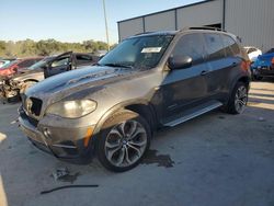 Salvage cars for sale from Copart Punta Gorda, FL: 2011 BMW X5 XDRIVE50I
