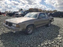 Oldsmobile salvage cars for sale: 1987 Oldsmobile Cutlass Supreme Brougham