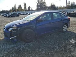 Salvage cars for sale from Copart Graham, WA: 2012 Ford Focus S