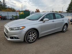 Salvage cars for sale from Copart Bowmanville, ON: 2014 Ford Fusion SE