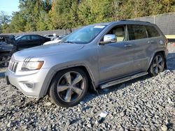 Jeep Grand Cherokee salvage cars for sale: 2014 Jeep Grand Cherokee Overland