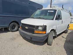 Salvage trucks for sale at Houston, TX auction: 2013 Chevrolet Express Utility / Service Van