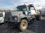 1997 Mack DM690S ROLL-OFF Container Truck