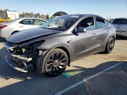 Tesla Model y salvage cars for sale: 2022 Tesla Model y