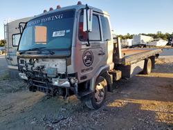 Salvage trucks for sale at Houston, TX auction: 2007 Nissan UD Rollback TOW Truck