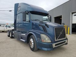 Salvage trucks for sale at Elgin, IL auction: 2005 Volvo VN VNL