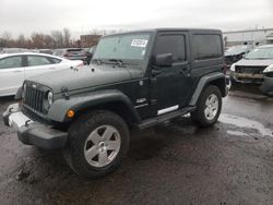 Jeep salvage cars for sale: 2011 Jeep Wrangler Sahara