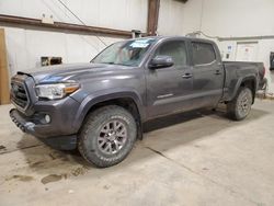 Salvage cars for sale from Copart Nisku, AB: 2018 Toyota Tacoma Double Cab