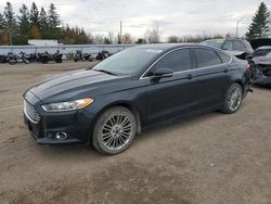 Salvage cars for sale from Copart Bowmanville, ON: 2014 Ford Fusion SE