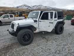 Salvage cars for sale from Copart Reno, NV: 2015 Jeep Wrangler Unlimited Sport