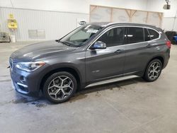 BMW x1 salvage cars for sale: 2018 BMW X1 XDRIVE28I