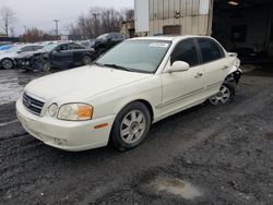 KIA salvage cars for sale: 2004 KIA Optima LX