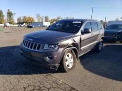 Jeep Grand Cherokee salvage cars for sale: 2014 Jeep Grand Cherokee Laredo