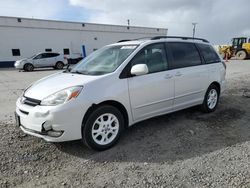 Toyota Sienna xle salvage cars for sale: 2005 Toyota Sienna XLE