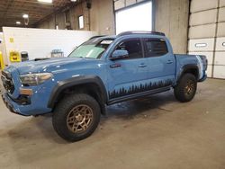 Salvage cars for sale from Copart Blaine, MN: 2018 Toyota Tacoma Double Cab