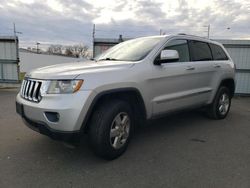 Jeep Grand Cherokee salvage cars for sale: 2012 Jeep Grand Cherokee Laredo