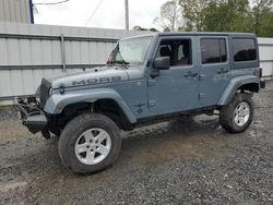 Jeep Wrangler salvage cars for sale: 2014 Jeep Wrangler Unlimited Sahara