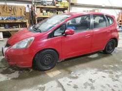 Salvage cars for sale from Copart Nisku, AB: 2009 Honda FIT LX